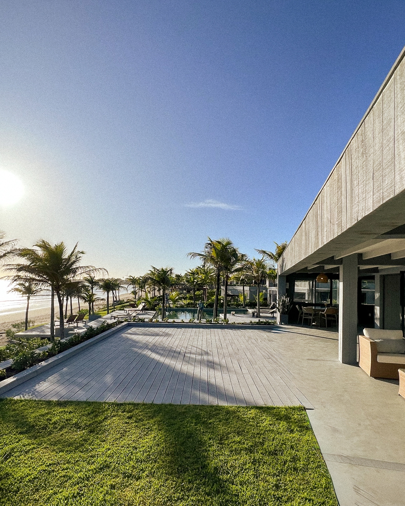 5/7 - Facade of Casa de Mar with terrace and tropical garden, Club de Mar, Amontada, Ceará